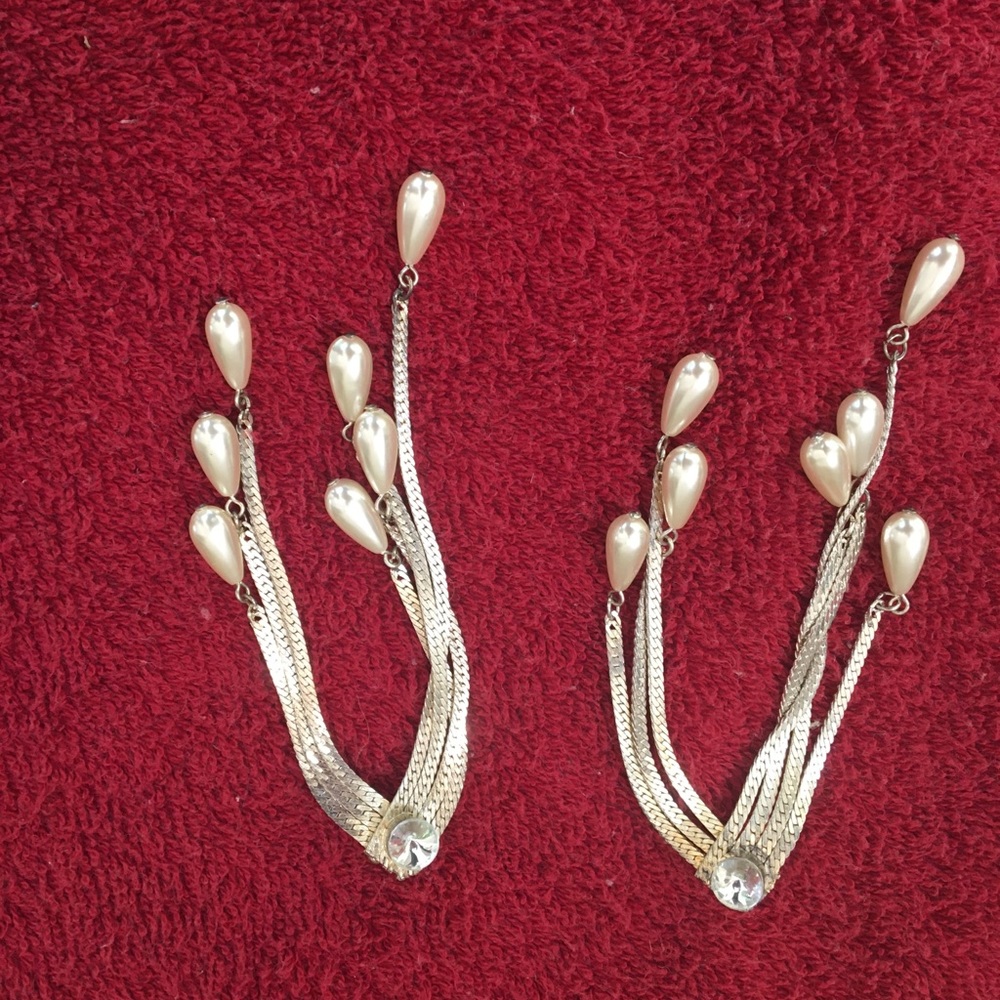 Silver earrings.